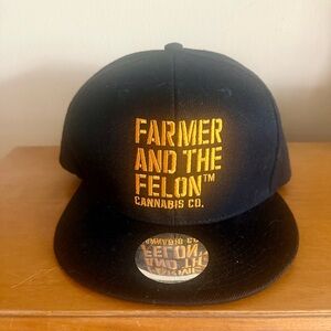 Rare Black and Gold Farmer and the Felon Cap